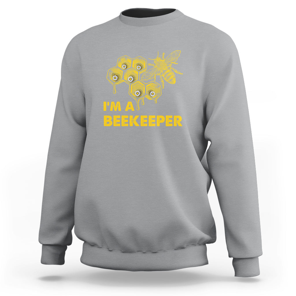 Sport gray crewneck sweatshirt with gold honeycomb bee graphic and "I'M A BEEKEEPER" text.