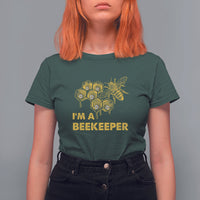 Dark forest green Beekeeper T-shirt with bee hive graphic and “I’M A BEEKEEPER” lettering
