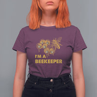 Maroon Beekeeper T-shirt with bee hive graphic and “I’M A BEEKEEPER” lettering