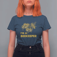 Navy Beekeeper T-shirt with bee hive graphic and “I’M A BEEKEEPER” lettering