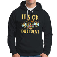 Black autism awareness hoodie with front pocket, drawstring hood, and bee graphic text