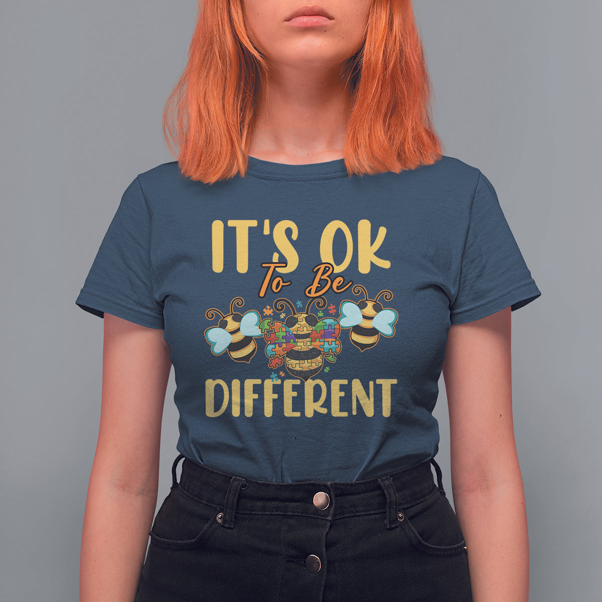 Women's bee graphic T-shirt, navy blue with colorful 'It's ok to be different' front print