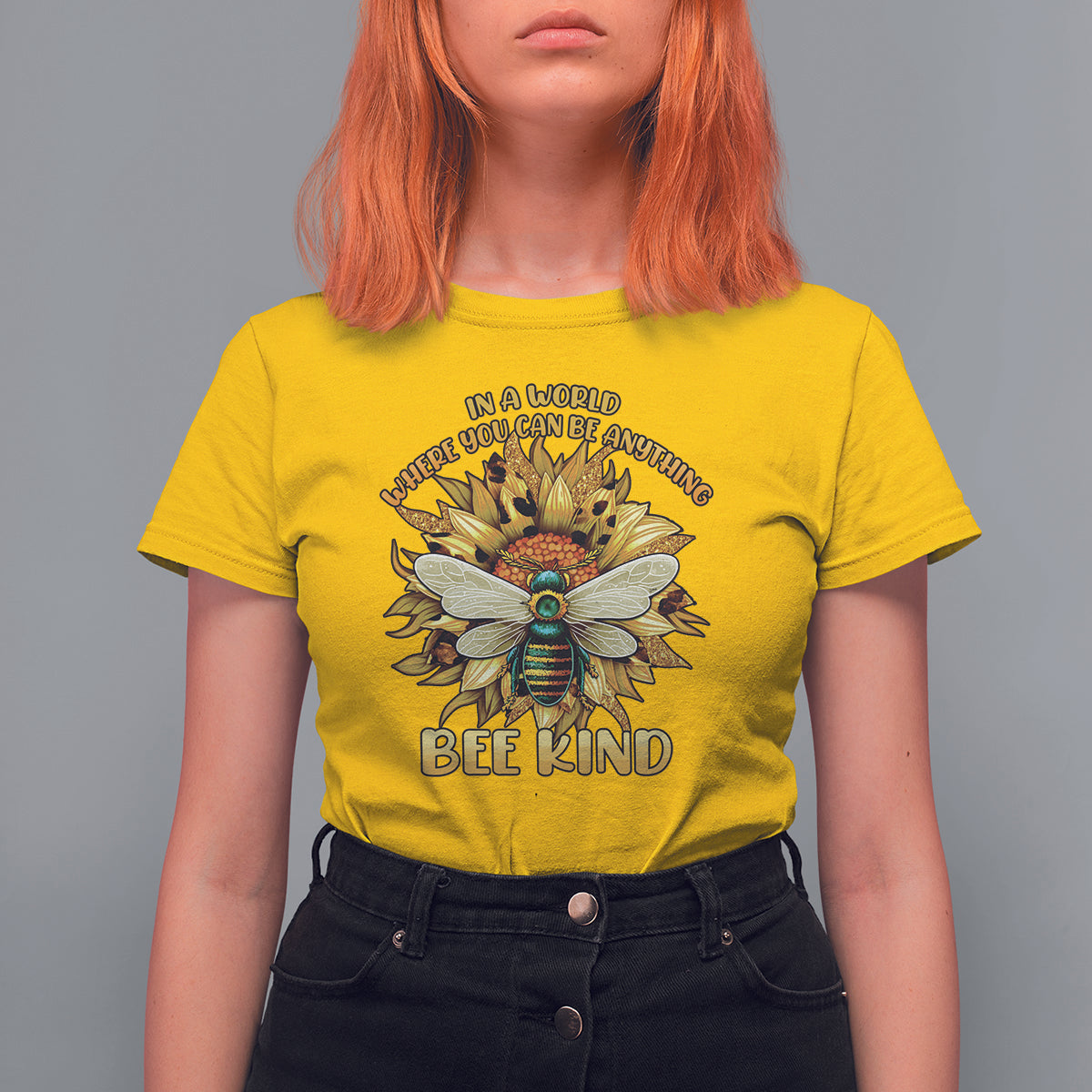 Daisy yellow "Bee Kind" T-shirt with large floral bee graphic centered on chest
