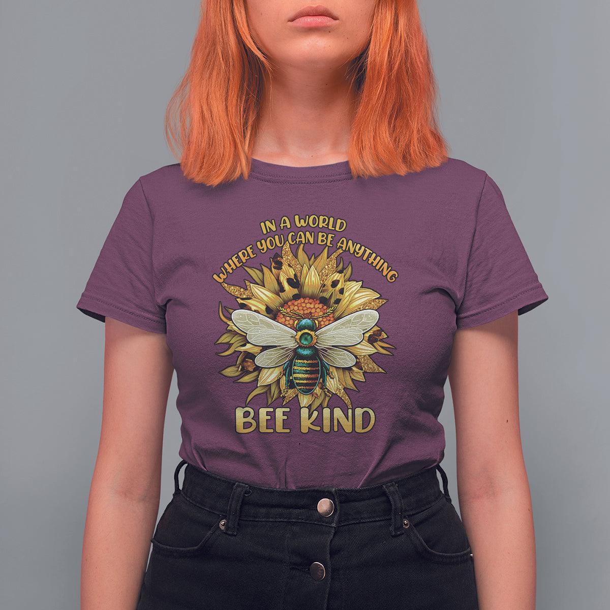 Maroon "Bee Kind" T-shirt with large floral bee graphic centered on chest