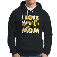 Black sunflower bee mom hoodie with floral bee graphic and text, front kangaroo pocket