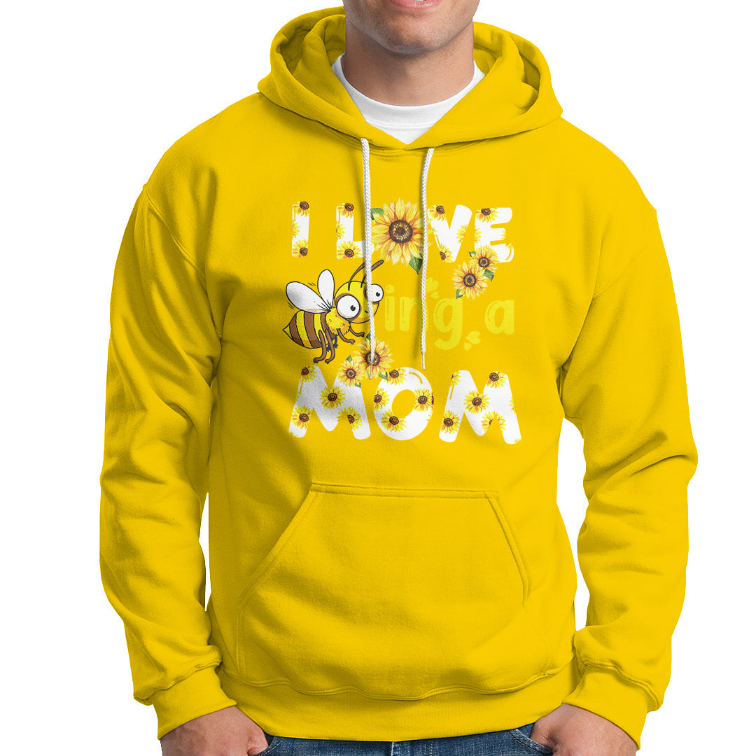 Daisy yellow sunflower bee mom hoodie with floral bee graphic and text, front kangaroo pocket