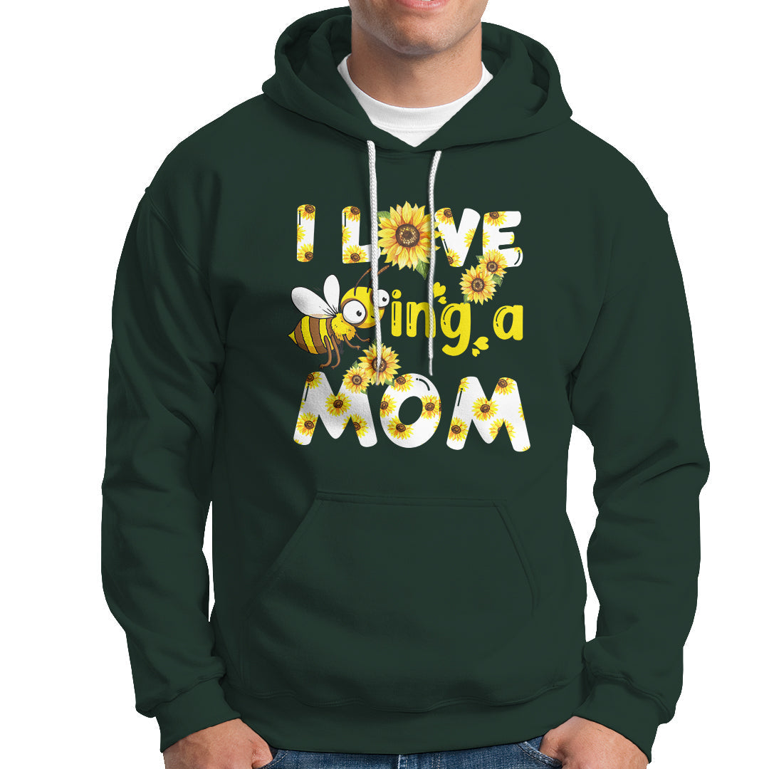 Dark forest green sunflower bee mom hoodie with floral bee graphic and text, front kangaroo pocket