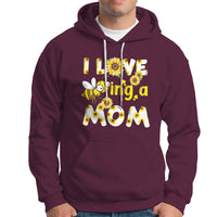 Maroon sunflower bee mom hoodie with floral bee graphic and text, front kangaroo pocket