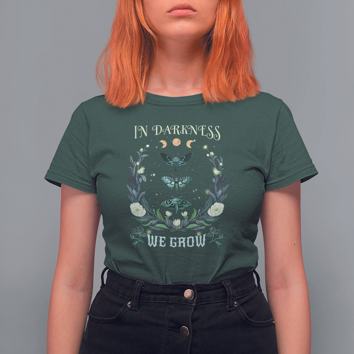 Women’s dark forest green t-shirt with teal moth and floral wreath graphic, crew neck