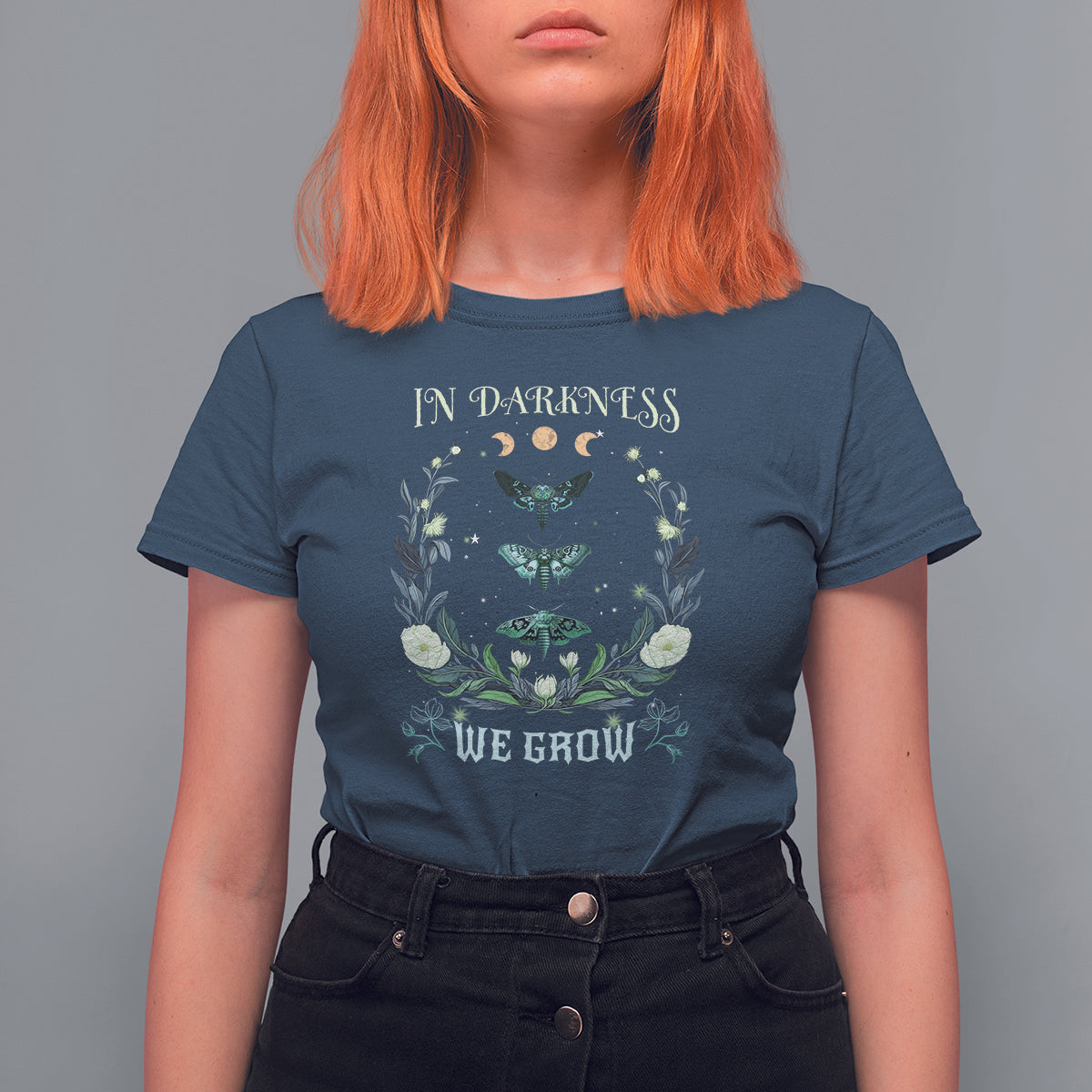 Women’s navy t-shirt with teal moth and floral wreath graphic, crew neck