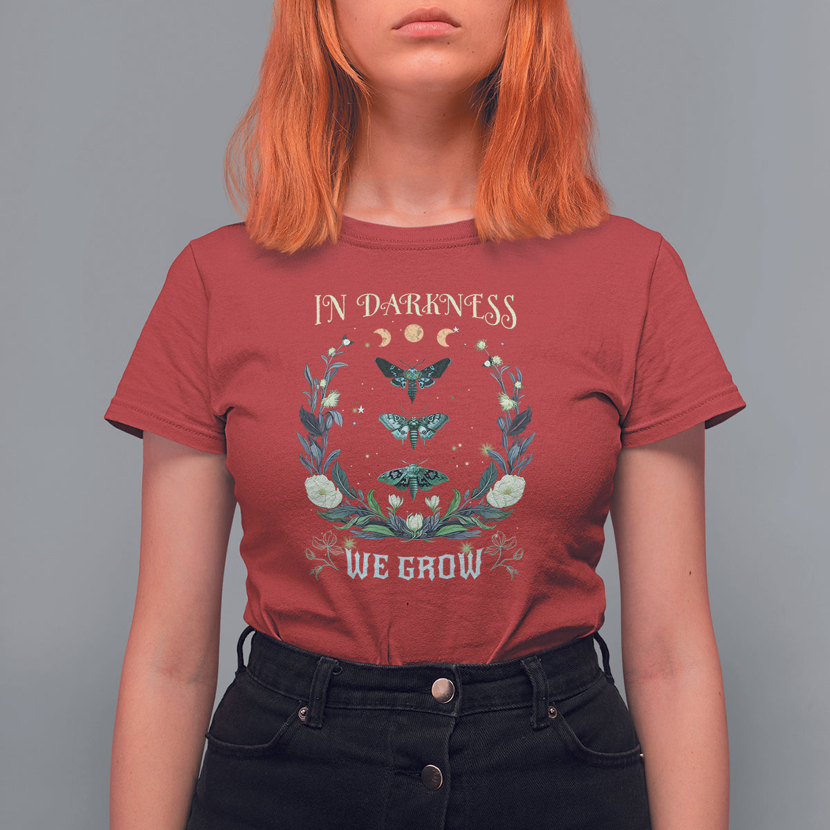 Women’s red t-shirt with teal moth and floral wreath graphic, crew neck