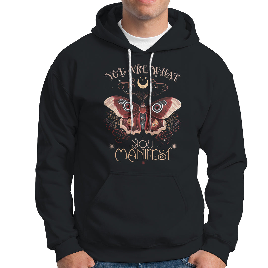 Black hoodie with front moth graphic and "You Are What You Manifest" text