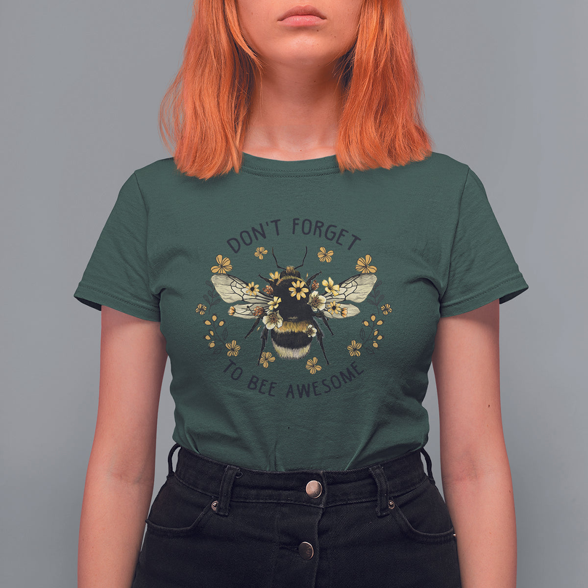 Women's short-sleeve T-shirt in dark forest green, front bee floral graphic with 'Don't forget to bee awesome'.