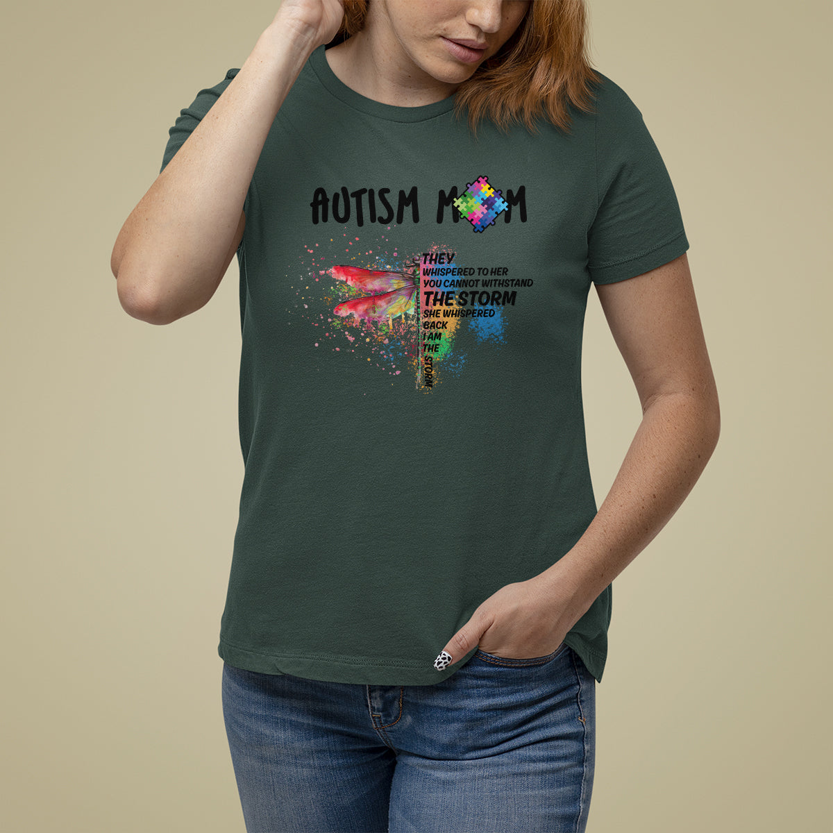 Women's autism awareness graphic T-shirt, dark forest green, rainbow puzzle dragonfly "storm"