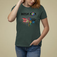 Women's autism awareness graphic T-shirt, dark forest green, rainbow puzzle dragonfly "storm"