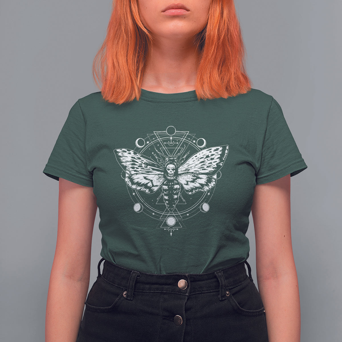 Women’s dark forest green graphic t-shirt with moth and moon phase mandala artwork, short sleeves