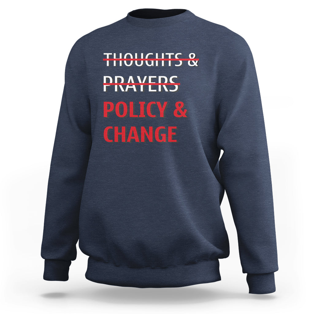 Navy crewneck sweatshirt with red 'Thoughts & Prayers Policy & Change' print
