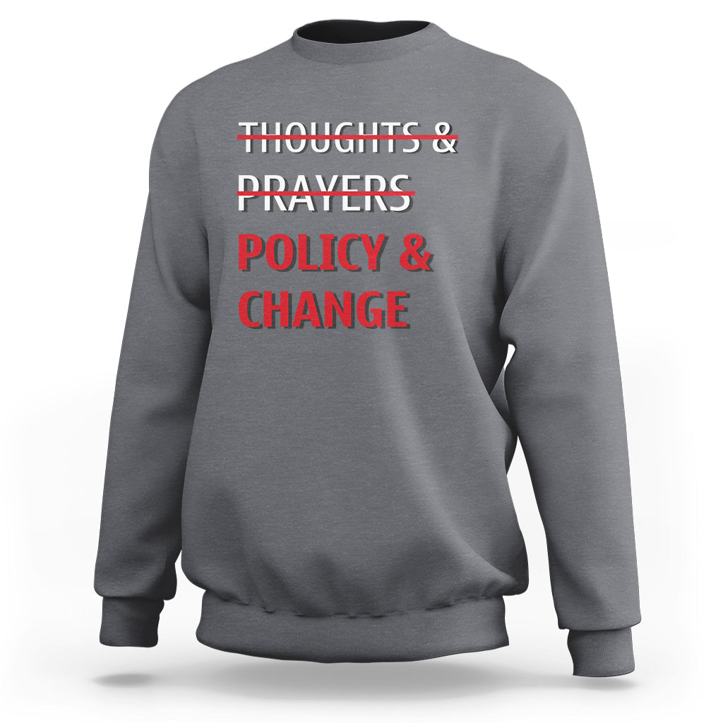Charcoal crewneck sweatshirt with red 'Thoughts & Prayers Policy & Change' print