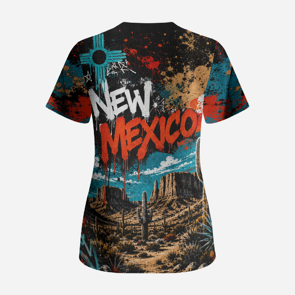 New Mexico Desert Road Sign Scrub Top Zia Symbol Grunge Paint Splatter Travel Graphic