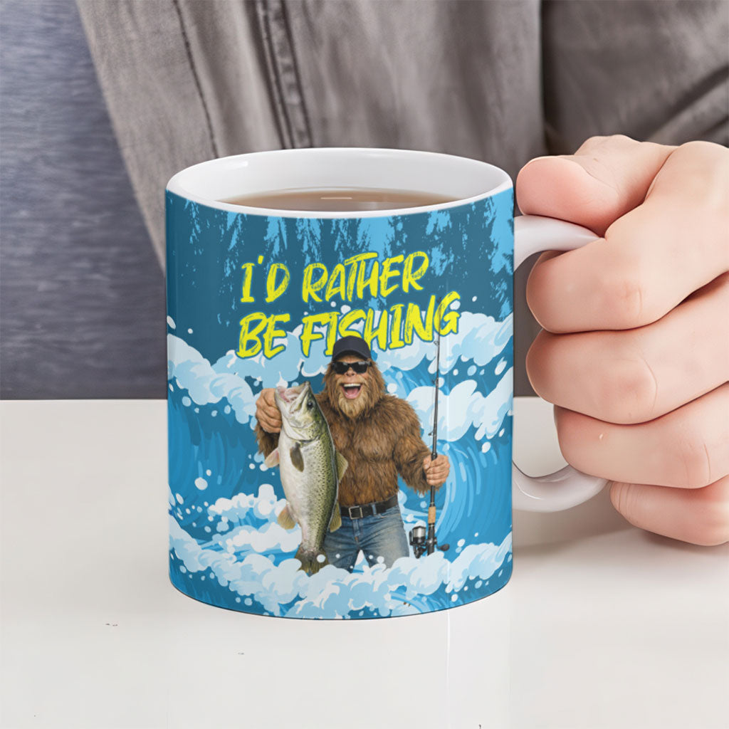 Bigfoot Sasquatch I'd Rather Be Fishing Ceramic Mug Funny Angler Humorous Outdoors Graphic Art