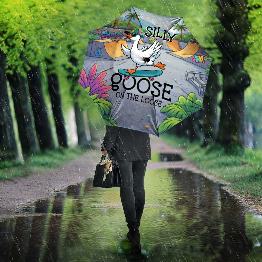 Funny Silly Goose on The Loose Umbrella with Skateboard and Palm Trees