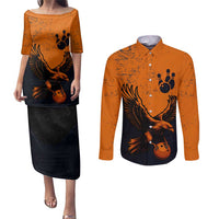 Flying Eagle Carrying Bowling Ball Couples Matching Puletasi and Long Sleeve Button Shirt with Grunge Orange and Black Splatter Design - Wonder Print Shop