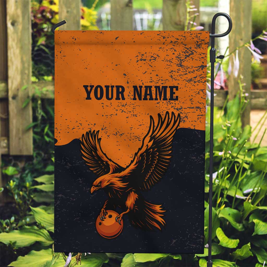 Flying Eagle Carrying Bowling Ball Garden Flag with Grunge Orange and Black Splatter Design - Wonder Print Shop
