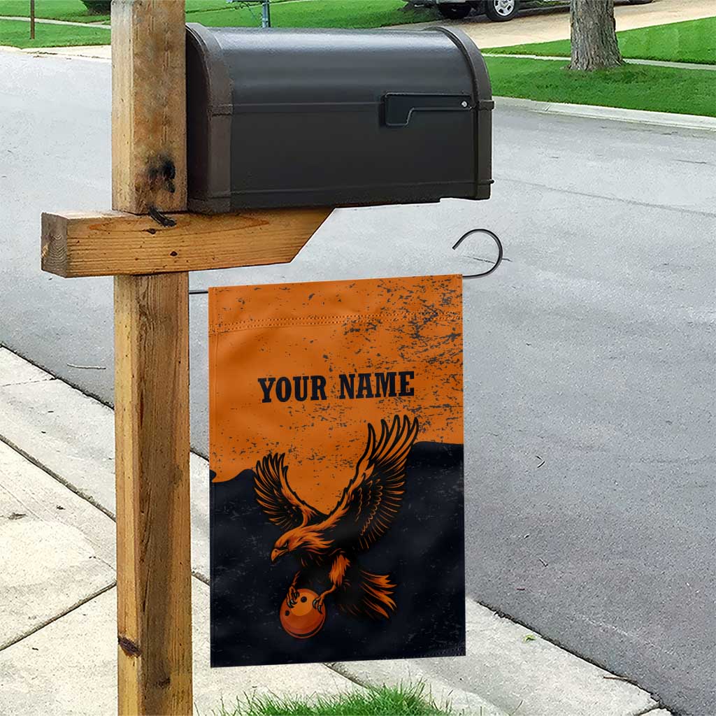 Flying Eagle Carrying Bowling Ball Garden Flag with Grunge Orange and Black Splatter Design - Wonder Print Shop