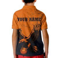 Flying Eagle Carrying Bowling Ball Kid Polo Shirt with Grunge Orange and Black Splatter Design - Wonder Print Shop