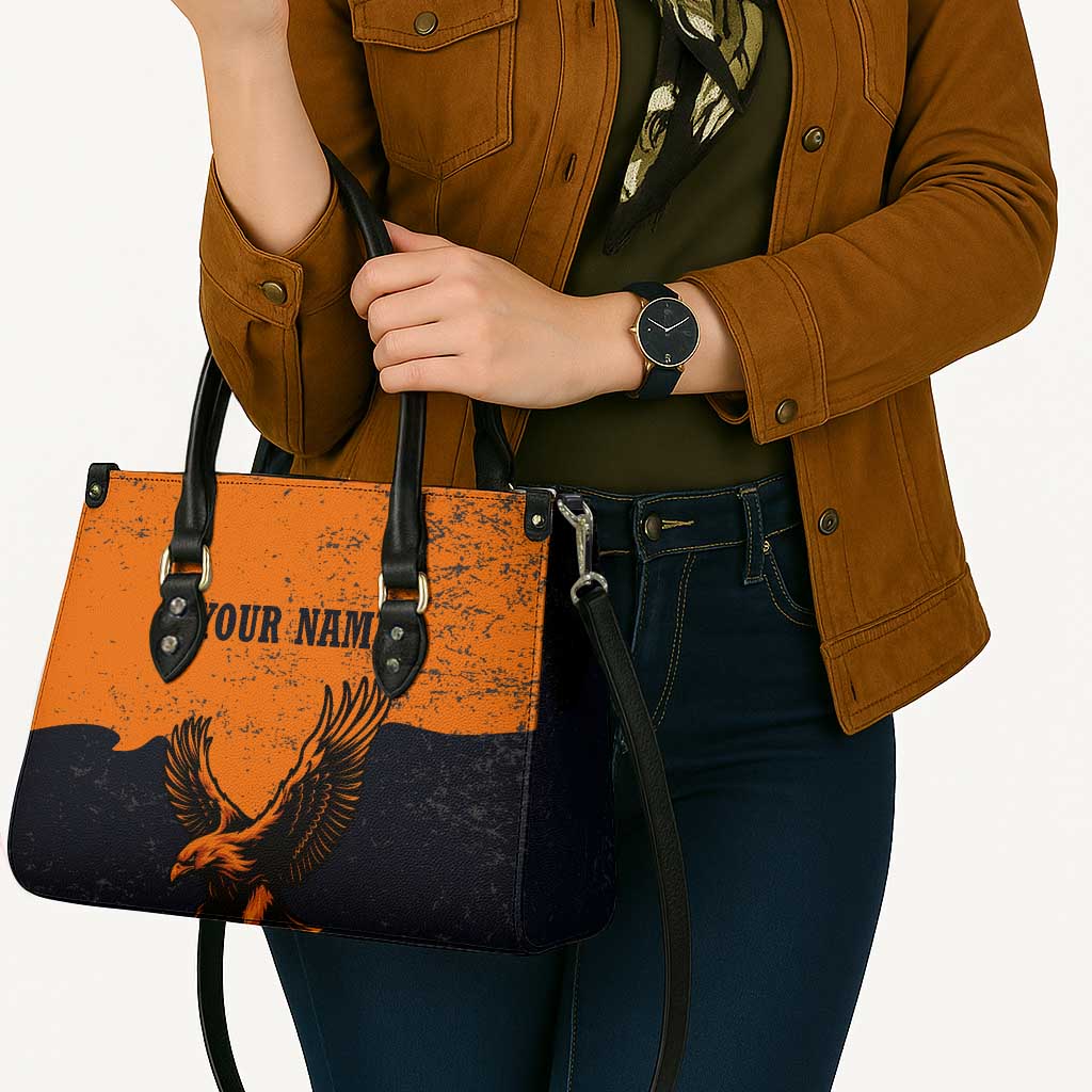 Flying Eagle Carrying Bowling Ball Leather Bag with Grunge Orange and Black Splatter Design - Wonder Print Shop