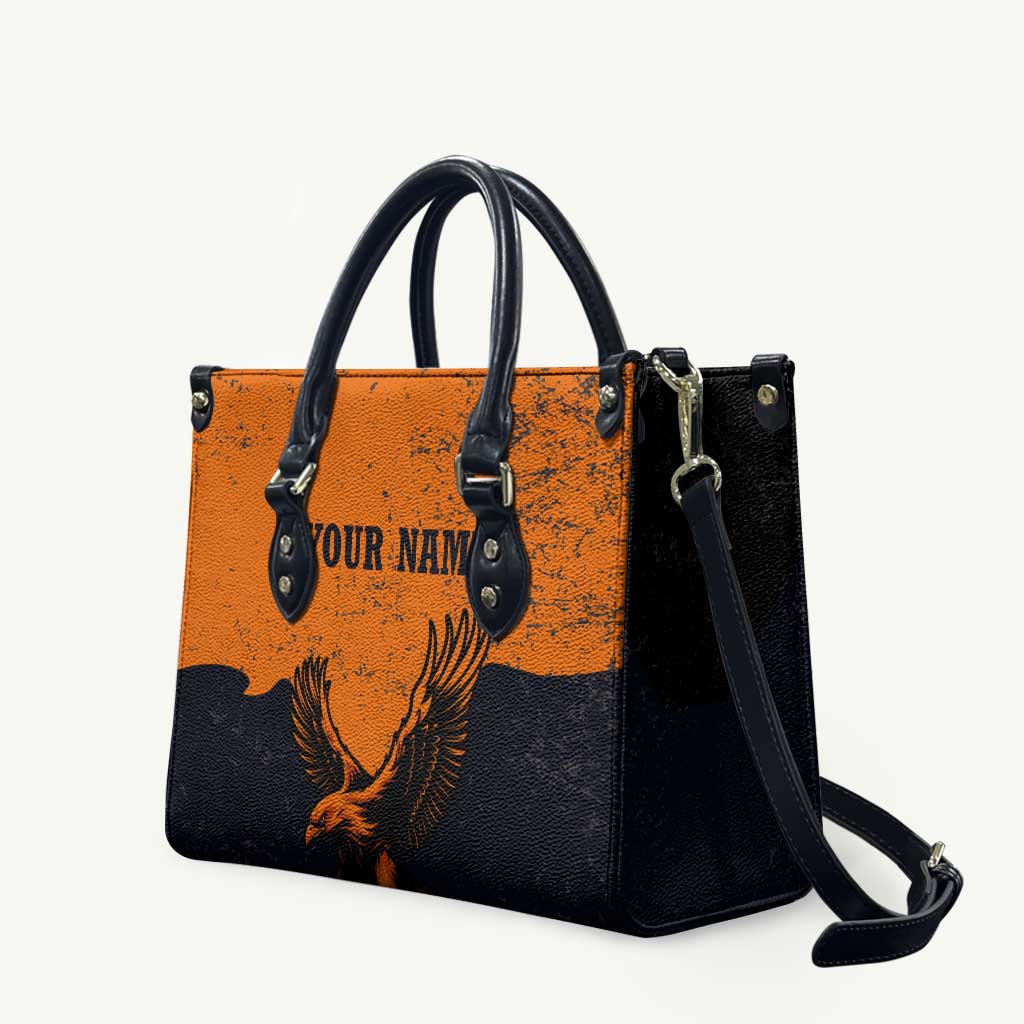 Flying Eagle Carrying Bowling Ball Leather Bag with Grunge Orange and Black Splatter Design - Wonder Print Shop