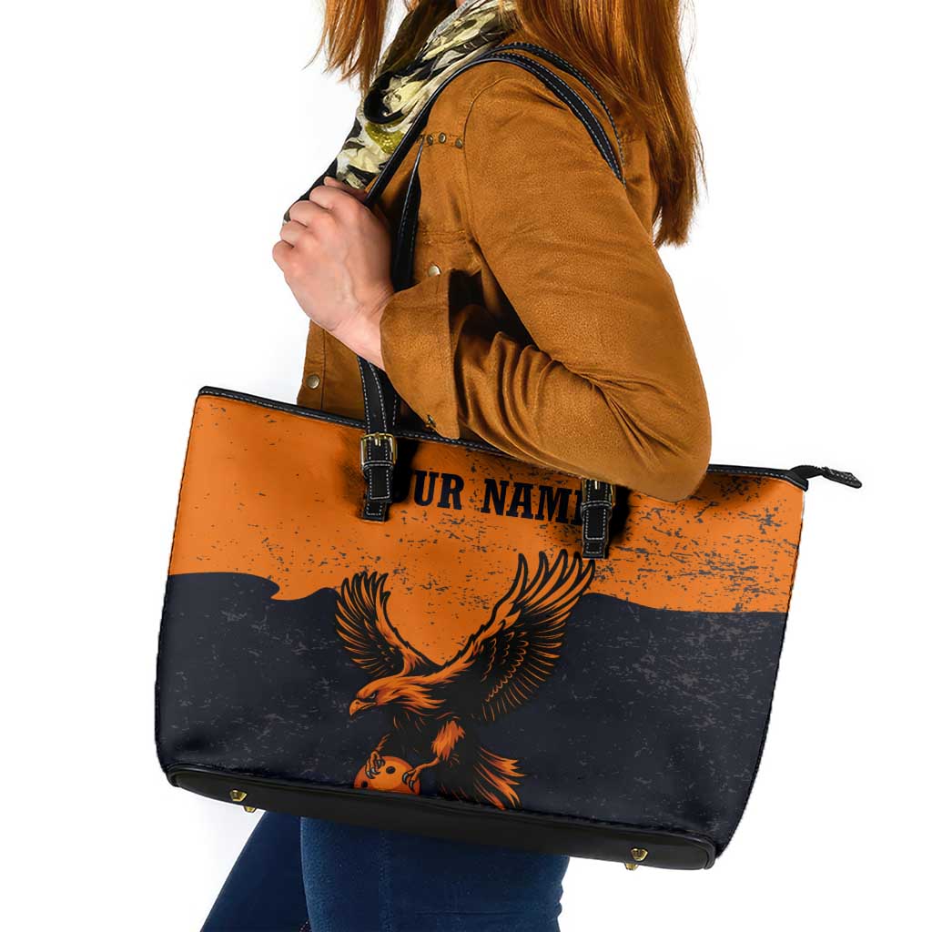 Flying Eagle Carrying Bowling Ball Leather Tote Bag with Grunge Orange and Black Splatter Design - Wonder Print Shop