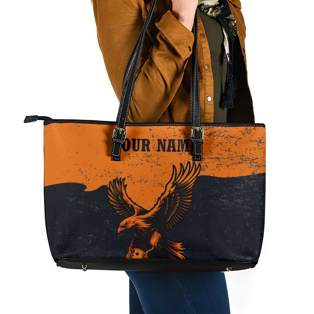 Flying Eagle Carrying Bowling Ball Leather Tote Bag with Grunge Orange and Black Splatter Design - Wonder Print Shop