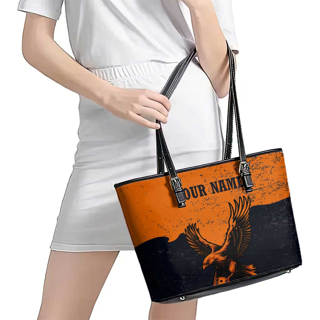 Flying Eagle Carrying Bowling Ball Leather Tote Bag with Grunge Orange and Black Splatter Design - Wonder Print Shop