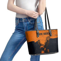 Flying Eagle Carrying Bowling Ball Leather Tote Bag with Grunge Orange and Black Splatter Design - Wonder Print Shop