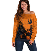 Flying Eagle Carrying Bowling Ball Off Shoulder Sweater with Grunge Orange and Black Splatter Design - Wonder Print Shop