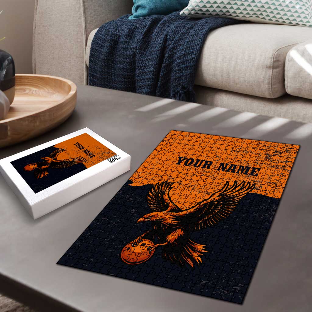 Flying Eagle Carrying Bowling Ball Puzzle with Grunge Orange and Black Splatter Design - Wonder Print Shop