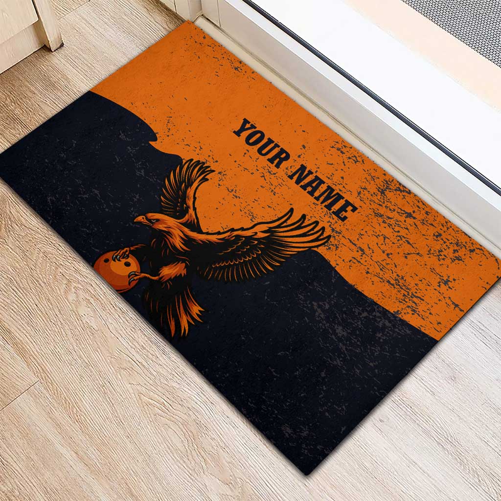 Flying Eagle Carrying Bowling Ball Rubber Doormat with Grunge Orange and Black Splatter Design - Wonder Print Shop