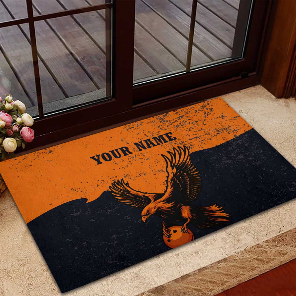 Flying Eagle Carrying Bowling Ball Rubber Doormat with Grunge Orange and Black Splatter Design - Wonder Print Shop