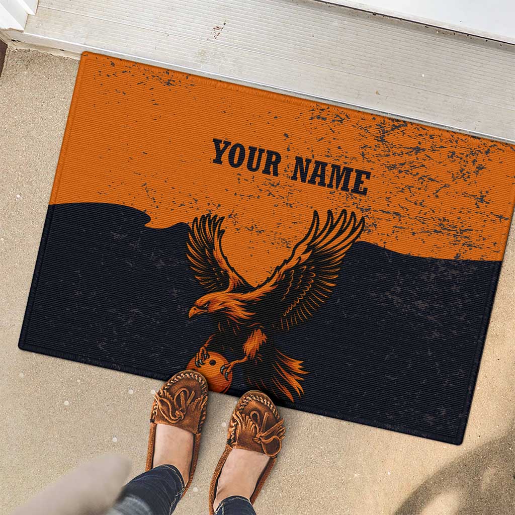 Flying Eagle Carrying Bowling Ball Rubber Doormat with Grunge Orange and Black Splatter Design - Wonder Print Shop