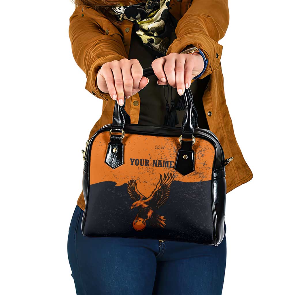 Flying Eagle Carrying Bowling Ball Shoulder Handbag with Grunge Orange and Black Splatter Design - Wonder Print Shop