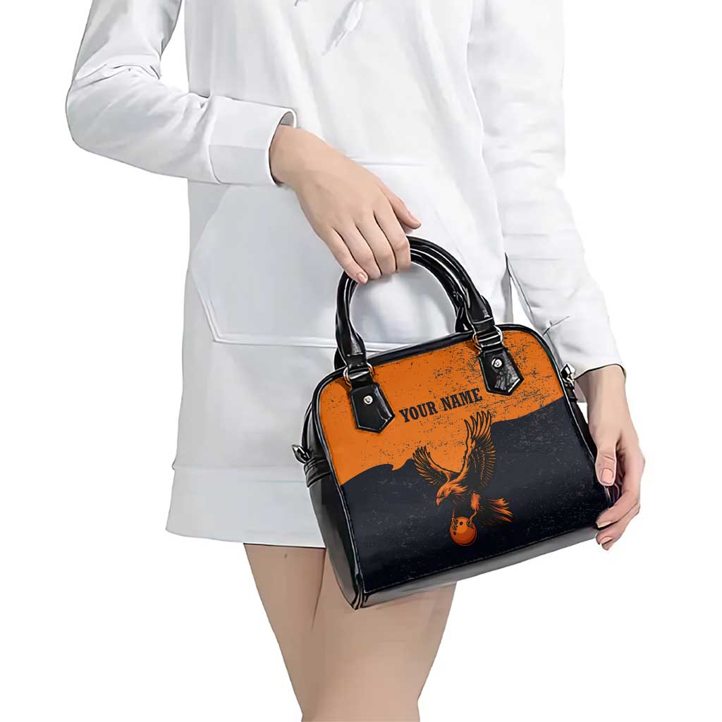 Flying Eagle Carrying Bowling Ball Shoulder Handbag with Grunge Orange and Black Splatter Design - Wonder Print Shop
