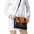 Flying Eagle Carrying Bowling Ball Shoulder Handbag with Grunge Orange and Black Splatter Design - Wonder Print Shop