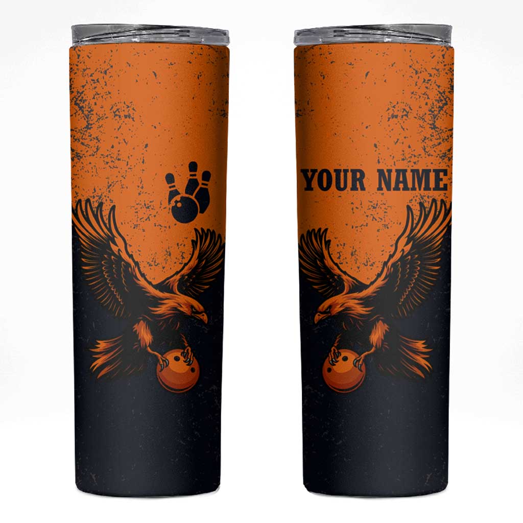 Flying Eagle Carrying Bowling Ball Skinny Tumbler with Grunge Orange and Black Splatter Design - Wonder Print Shop
