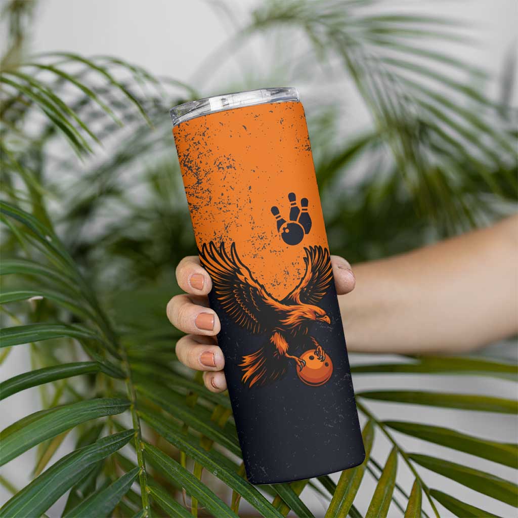 Flying Eagle Carrying Bowling Ball Skinny Tumbler with Grunge Orange and Black Splatter Design - Wonder Print Shop