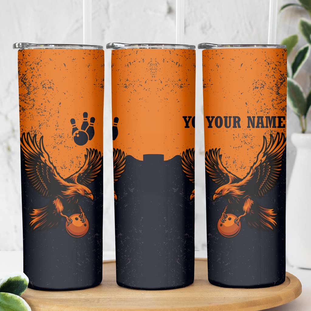 Flying Eagle Carrying Bowling Ball Skinny Tumbler with Grunge Orange and Black Splatter Design - Wonder Print Shop