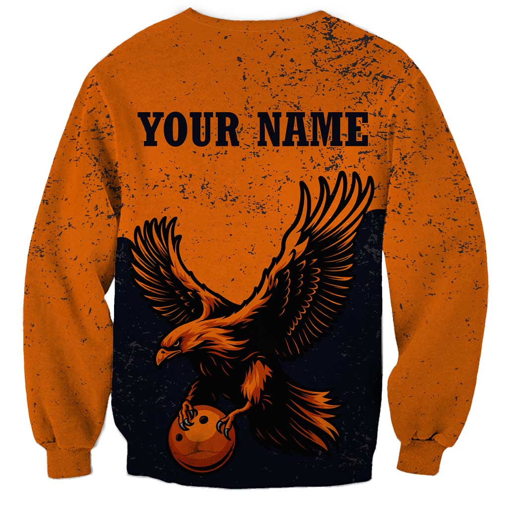 Flying Eagle Carrying Bowling Ball Sweatshirt with Grunge Orange and Black Splatter Design - Wonder Print Shop