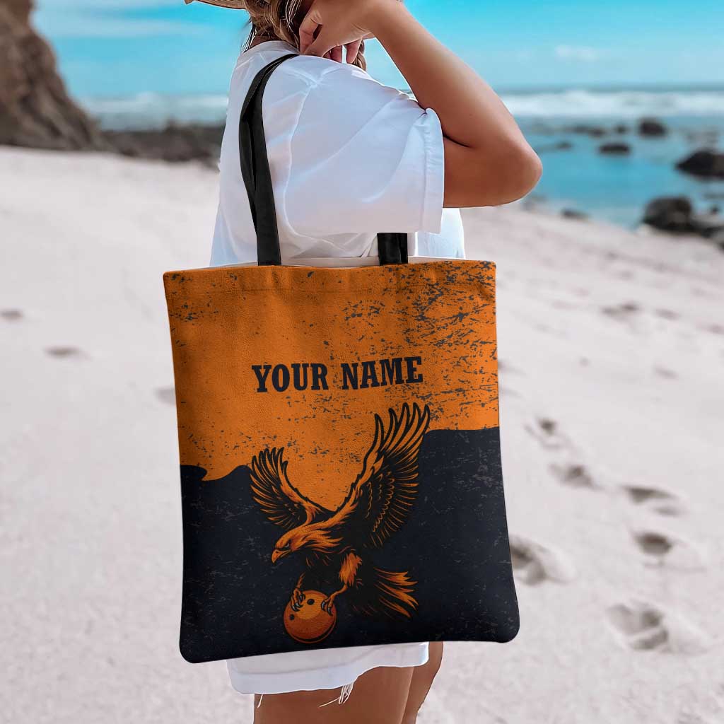 Flying Eagle Carrying Bowling Ball Tote Bag with Grunge Orange and Black Splatter Design - Wonder Print Shop