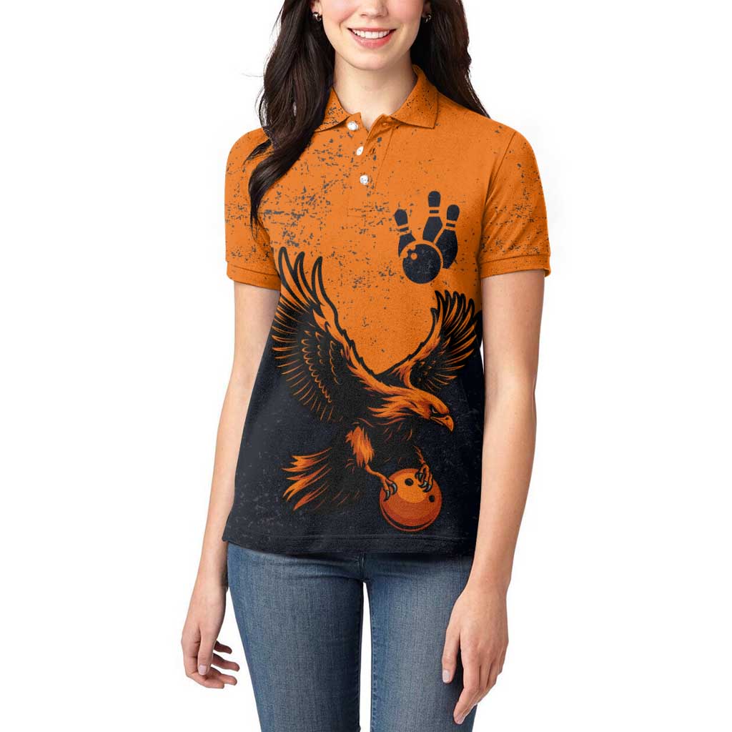 Flying Eagle Carrying Bowling Ball Women Polo Shirt with Grunge Orange and Black Splatter Design - Wonder Print Shop