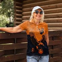 Flying Eagle Carrying Bowling Ball Women Polo Shirt with Grunge Orange and Black Splatter Design - Wonder Print Shop